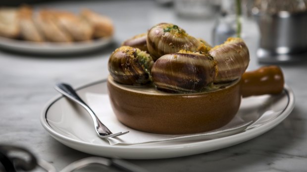 Escargot are an excuse to made dunk-it-yourself garlic bread.