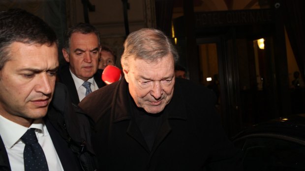 Cardinal George Pell leaves the Quirinale Hotel following the Royal Commission hearing on Tuesday.