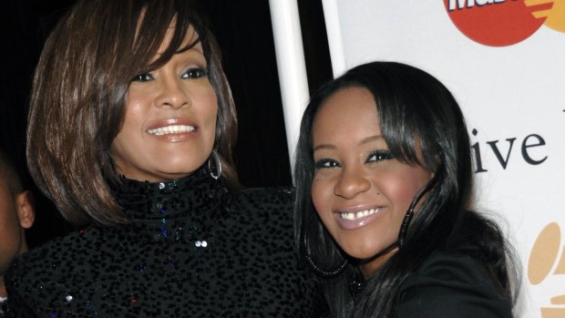 Whitney Houston, left, and daughter Bobbi Kristina Brown in 2011.