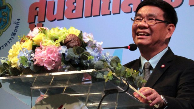 Thailand's Election Commissioner Somchai Srisutthiyakorn announces that voters had backed a constitution that lays the foundation for a civilian government influenced by the military and controlled by appointed officials.