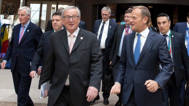 New confidence: from left, the European Union's chief Brexit negotiator, Michel Barnier, European Commission president Jean-Claude Juncker and European Council president Donald Tusk in Brussels on Saturday.