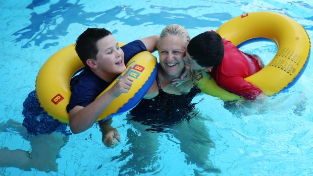 James Collier,12, and brother Ben, 8, with Rainbow Club swimming instructor Wendy Robinson at Sutherland Leisure Centre. 