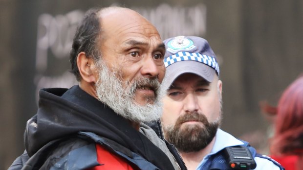 Leader of tent city Lanz Priestly talks to police at Martin Place. 