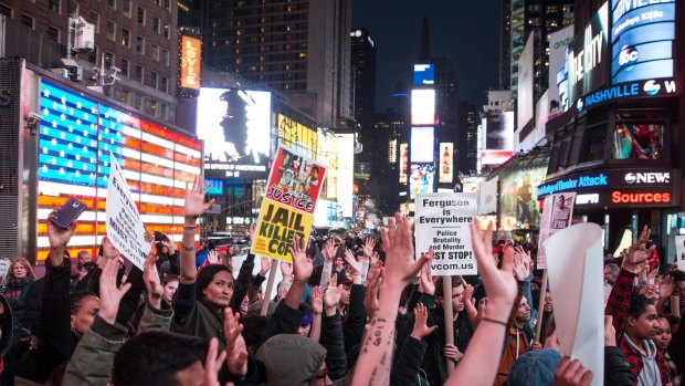 Ferguson response: Protesters rally in Times Square in New York.