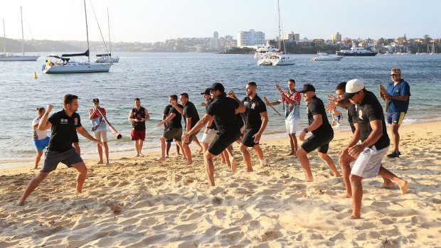 Connected: The players practise their Indigenous dance during a camp on Clark Island.
