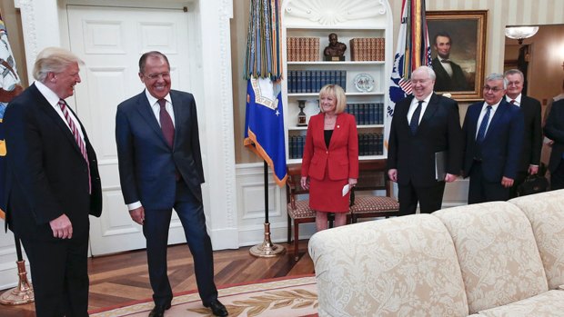 Laughs all round: US President Donald Trump meets with Russian Foreign Minister Sergei Lavrov. Russian ambassador to the US Sergey Kislyak is fourth from left.