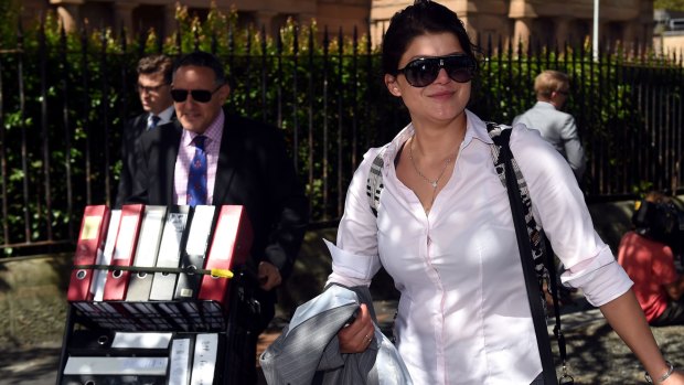 Katherine Abdallah departs the NSW Supreme Court on Monday with barrister Gregory Stanton after being found guilty of manslaughter. 
