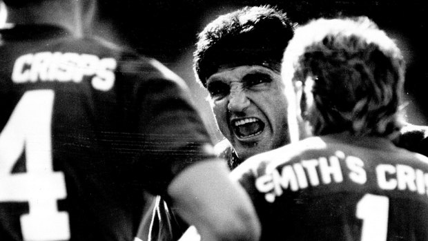 The face of aggression: Mario Fenech rallies his troops after a Balmain try in 1989.  