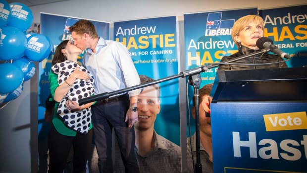 Andrew Hastie  and wife Ruth celebrate their win at the Pinjarra Bowling Club as Julie Bishop speaks to the crowd.