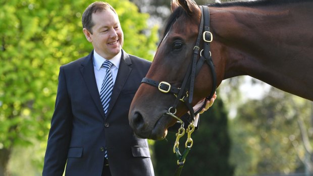 Adam Rytenskild, Tabcorp's chief operating officer of wagering, with Justice Faith.