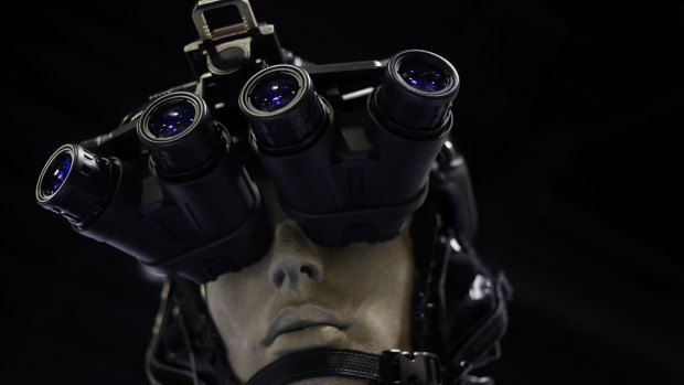 Traditional night-vision goggles are displayed on a at a military conference in Florida. 