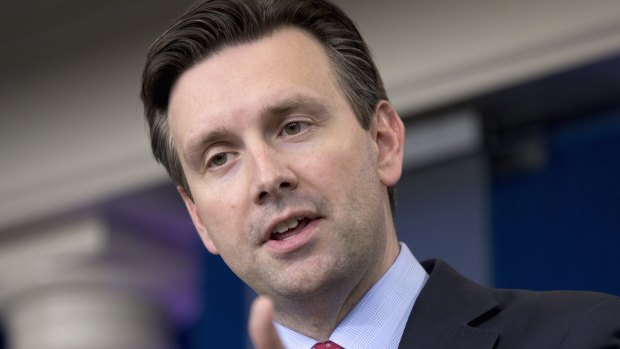 White House press secretary Josh Earnest speaks during a news briefing outlining the President's views on gun laws.