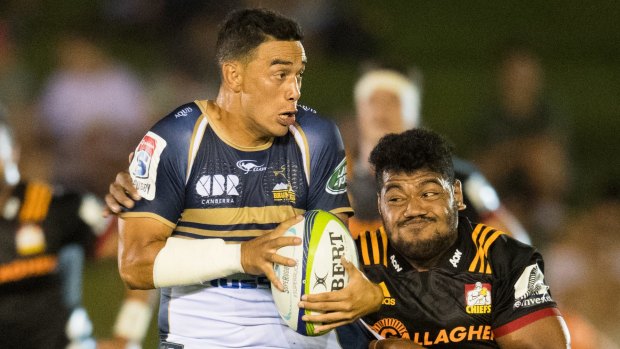 Wharenui Hawera of the Brumbies battles the Chiefs in a trial match.