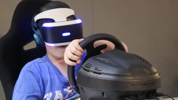 Josh Moody, 14, tries out the Playstation VR headset at Westfield Belconnen.
