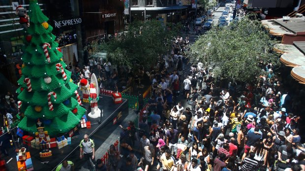 Hundreds of shoppers flooded the Pitt Street mall on Boxing Day last year.