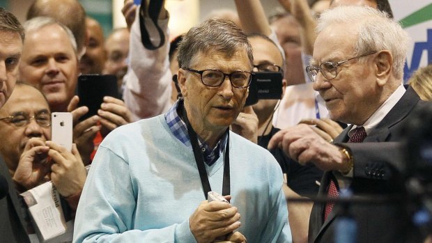 Friends Bill Gates and Warren Buffett. Will they accept the Ice Bucket Challenge?