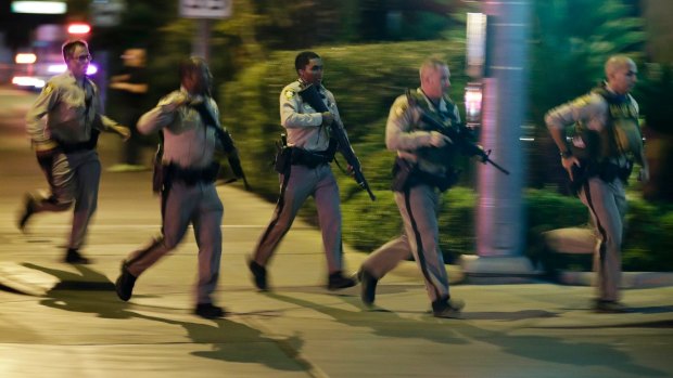 Police at the scene of a shooting near the Mandalay Bay resort and casino on the Las Vegas Strip.