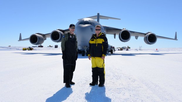 Polar milestone:  Air Commodore Richard Lennon (left) and Australian Antarctic Division director Nick Gales mark the arrival of the RAAF C-17 Globemaster in Antarctica.