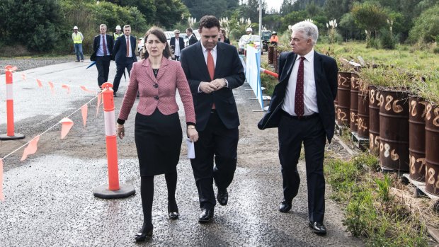 Premier Gladys Berejiklian (left), WestConnex Minister Stuart Ayres and Sydney Motorway Corporation chief executive Dennis Cliche early this month.