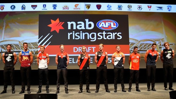 The top ten draft picks line up at the Adelaide Convention Centre on Tuesday.