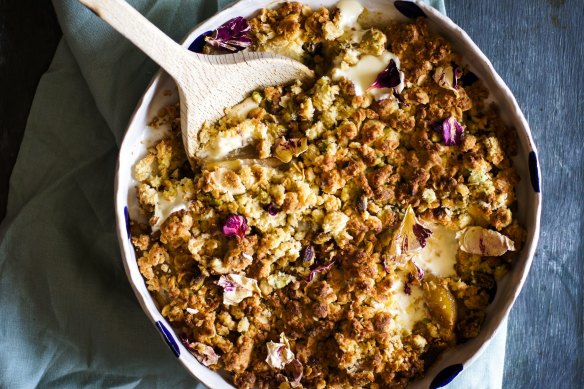 Pear crumble with pools of melted white chocolate.