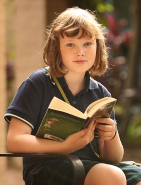 Ten-year-old Madeleine Hayen has a kindle, but still goes to Glebe Library once a week to pick up a new batch of books.