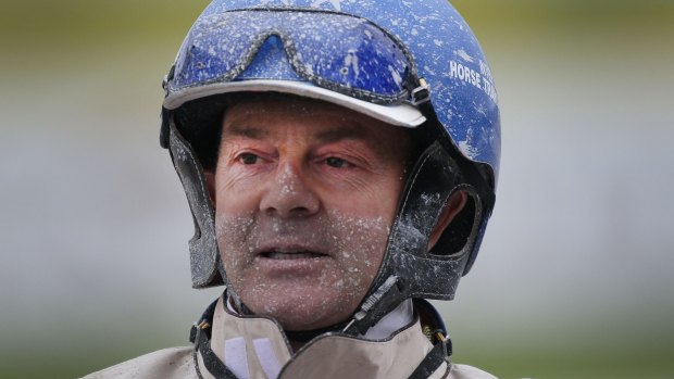Driver Mark Purdon covered in mud after winning two group 1 races  at Alexandra Park. 