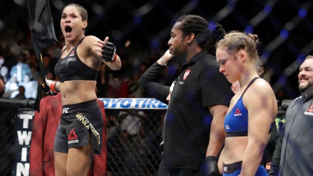 Amanda Nunes celebrates her win over  Ronda Rousey.