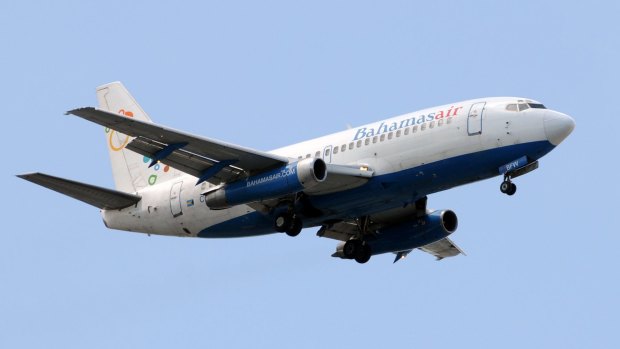 Bahamasair Boeing 737 passenger jet landing at Miami international Airport.
