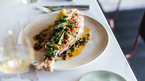 Whole baked snapper with chermoula and okra.