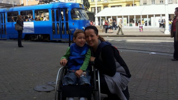 Adrian and Sanja Zuvela in Croatia, where Adrian received 'intense therapy' for cerebral palsy.