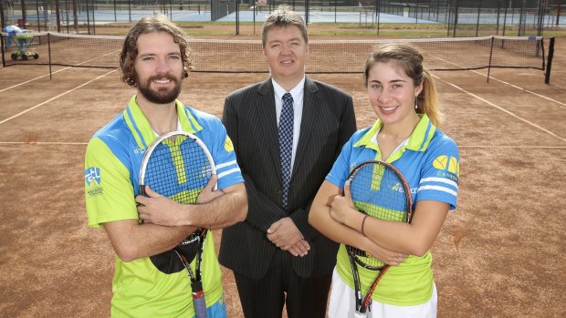 Jake Eames, Tennis ACT CEO Ross Triffitt and Imogen Clews at the Canberra Tennis Centre in Lyneham.