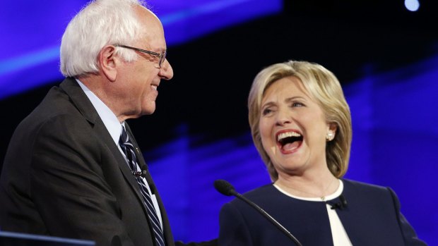Senator Bernie Sanders, of Vermont and Hillary Rodham Clinton share a laugh during the CNN Democratic presidential debate.