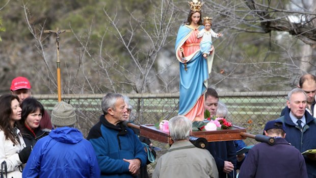 Anti-abortion protesters hold a vigil outside a Melbourne medical clinic.