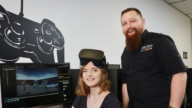 SAE bachelor of games development student  Victoria McAlary and lecturer Geoff Hill.
