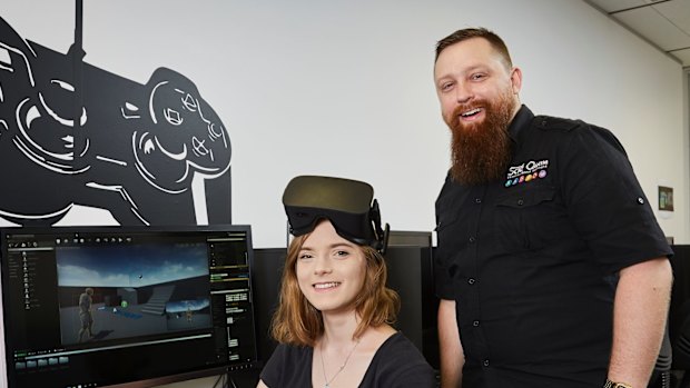 SAE bachelor of games development student  Victoria McAlary and lecturer Geoff Hill.