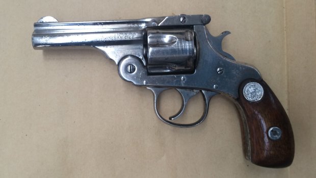 A pistol seized by police in the raids on Friday.