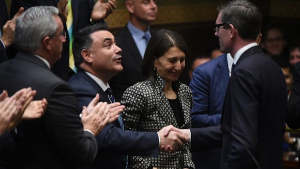 NSW Treasurer Dominic Perrottet receives congratulations on his first budget. 