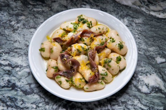Giant white beans with anchovies and citrus zest are part of the new all-day menu of small plates.