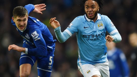 New teammates: John Stones (in action for Everton in January) and Raheem Sterling.