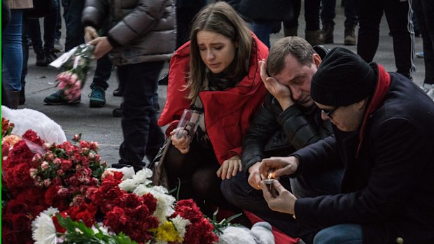 Mourners at Pulkovo Airport, St Petersburg.