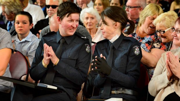 The Victoria Police First Constable Emma Quick, left, and Constable Varli Blake at the Southern Metro Region Division 1 Honours and Awards Ceremony. 