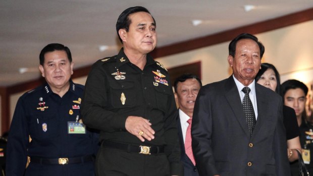 Heneral Prayuth Chan-ocha (centre) ordered raids on 44 Bangkok IVF clinics.