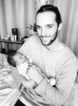 Kate's partner Aaron with baby Mason.