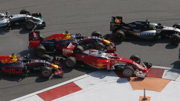 Crash: Red Bull driver Daniil Kvyat, bottom left, collides with Sebastian Vettel, centre, who subsequently hit Australian driver Daniel Ricciardo.