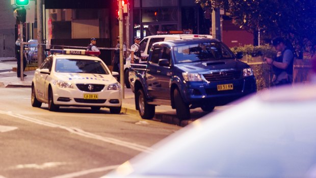 A police employee was shot dead outside the headquarters in Parramatta.