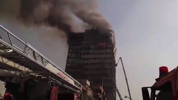 Firefighters battled the blaze at the Plasco building for several hours before its collapse.