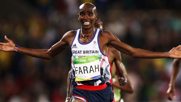 Mo Farah crosses the line to win the 10,000m after falling during the race. He narrowly avoided another fall in the 5000m.