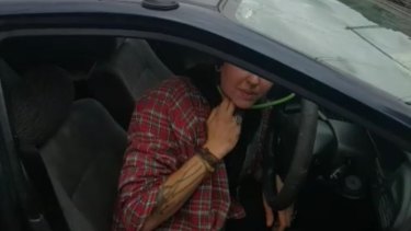 Protester "Justine" inside the car at Ascot Vale.