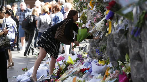 Remembering victims: Floral tributes continued to be left at Martin Place on Wednesday.